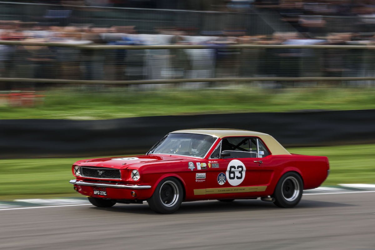 Racing Renegade: A Thrilling Journey with Rockenfeller in a Historic Mustang at Goodwood