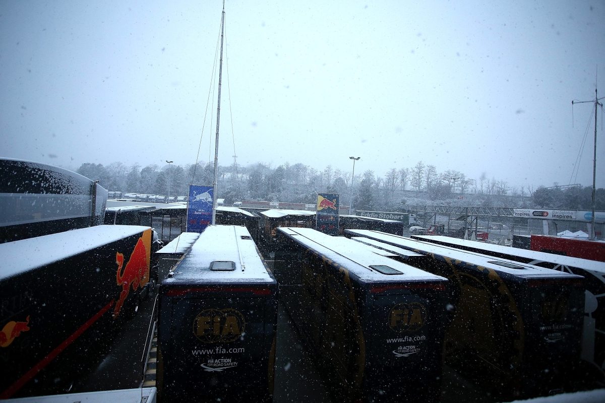 Revving Through the Snow: F1 Team's Stunning Snow-Covered Headquarters Amidst Harsh Weather Conditions