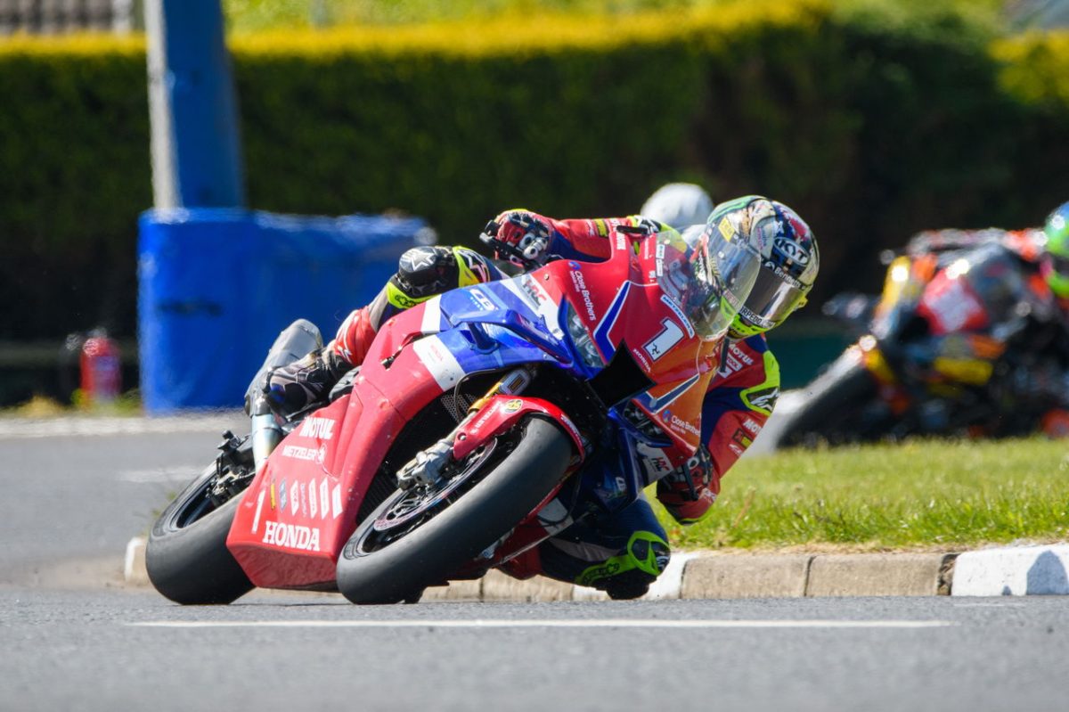 The Thrilling World of Road Racing: John McGuinness Reflects on the Tough Battle Ahead in 2025