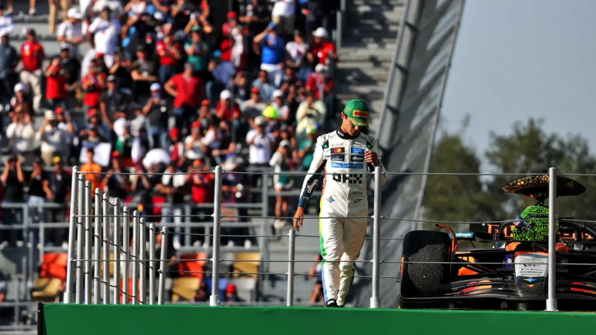 Lando Norris reacts to crowd boos after F1 Mexico GP win